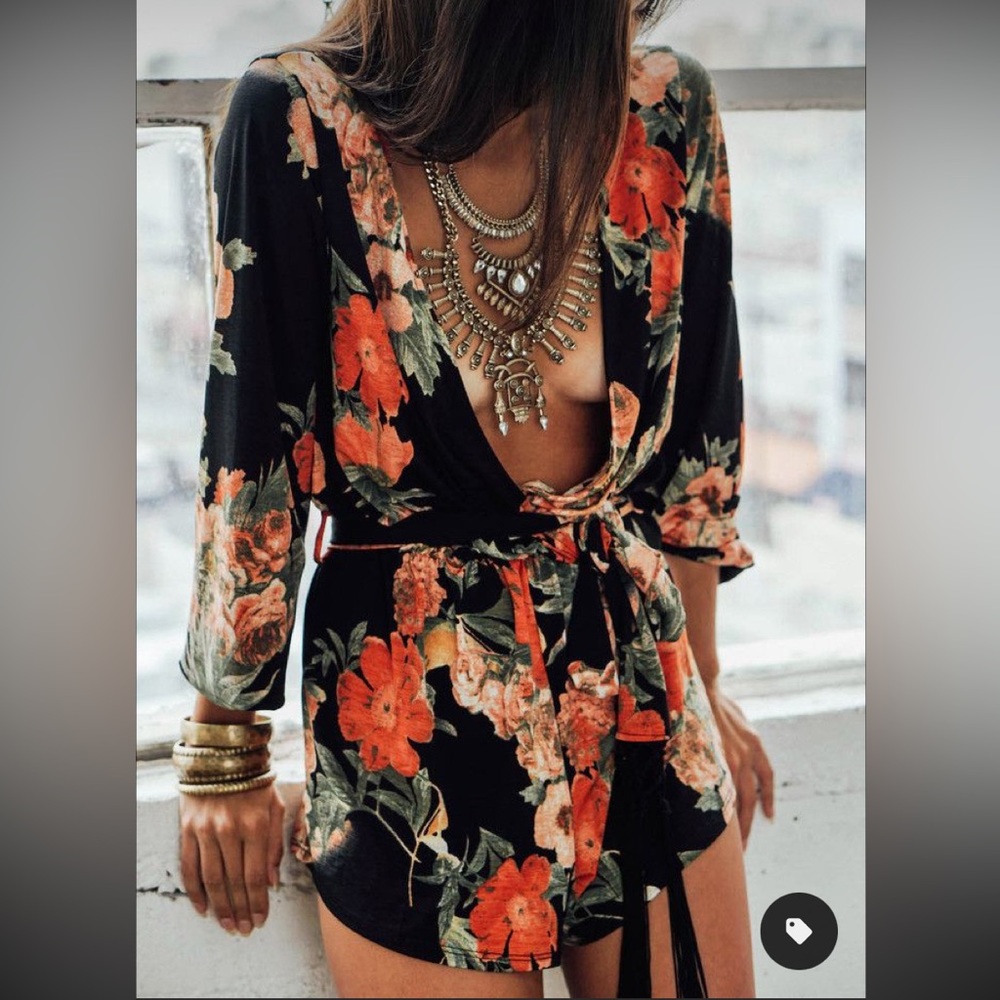 Size M floral romper with fringed self-tie belt
